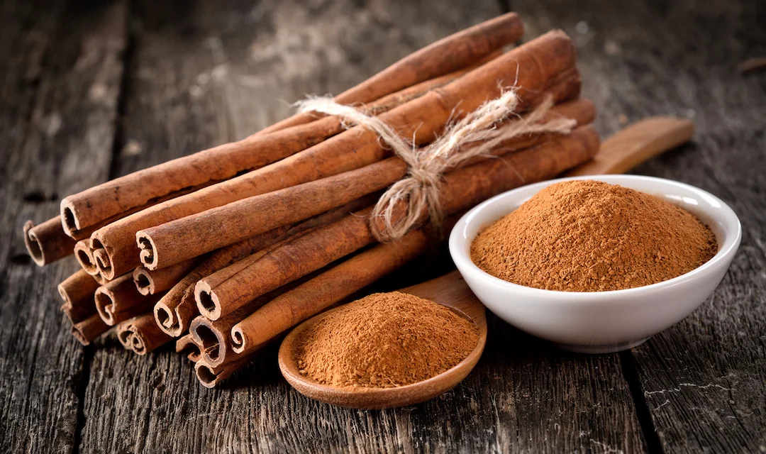 A Bunch of Cinnamon Stick Placed on a Wooden Table
