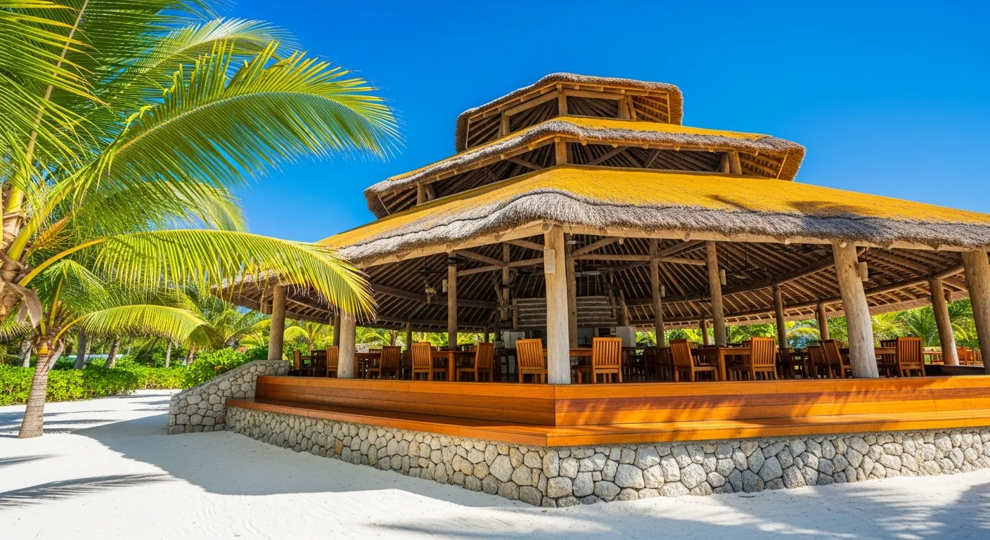An Inviting Open-air Restaurant Building, Distinguished by Its Impressive Multi-tiered, Golden-yellow Thatched Roof